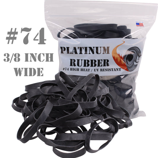 A bulk bag of black rubber bands labeled #74 Platinum Rubber, indicating 3-1/2 inch width and high heat/UV resistant properties. The bag is sealed and labeled with the product details.