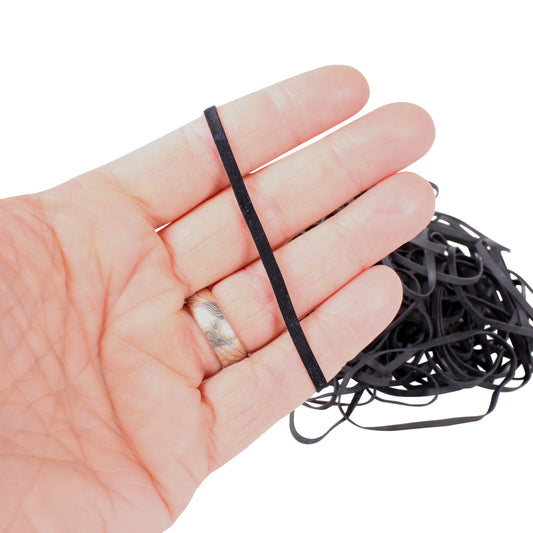 #33 rubber bands on hand showing the size comparison