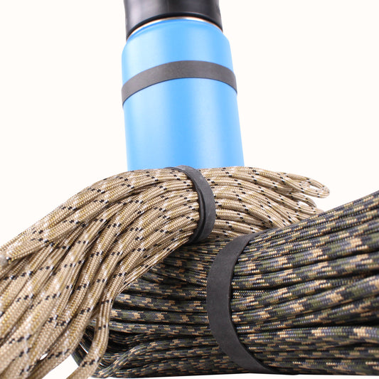 photo of rubber bands used to bind paracord and as a rubber grip on bottle